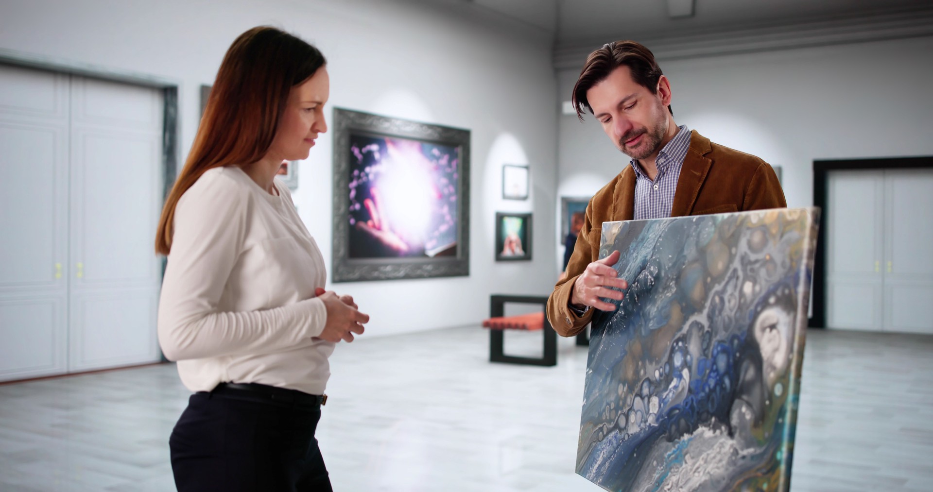 Two Young Artists Browse Modern Art Gallery