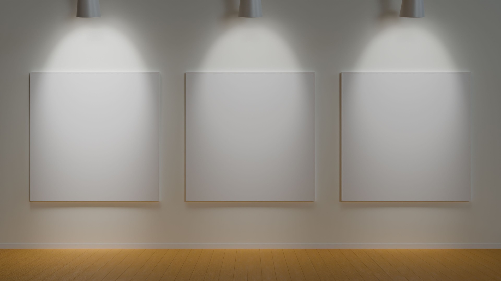 Three blank canvases in a modern gallery, illuminated by spotlights